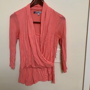 Faux wrap asymmetrical hem top